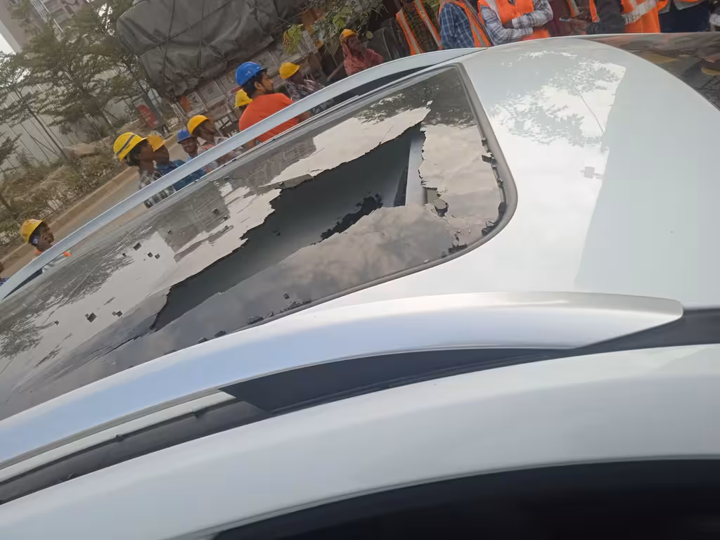 Candeur Lakescape Negligence Huge Rock Falls on Car in Kondapur 